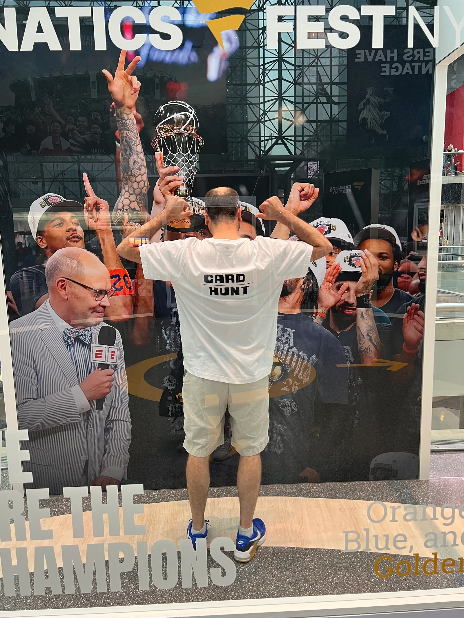 A CardHunt team member at the New York Knicks championship display.